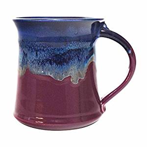 Hygge is all about tactile pleasures so choose a mug that not only looks good on your shelf but feels good in your hands. My favorite mug is similar to this one by Clay in Motion.